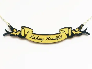 Fucking Beautiful swallow and scroll necklace